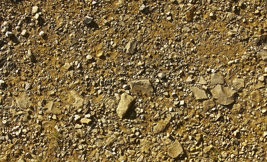 carril, terra, agregat, patró, textura, estructura, resum, fons, sòl, naturalesa, pedra petita, tarteres, erosió, superfície, pedra natural, material natural, cap gent, marc complet, dia, vista d’angle alt, a l'aire lliure, primer pla, llum solar, sòlid, carretera, brutícia, marró, vell, transport, aspre, rock, 5K