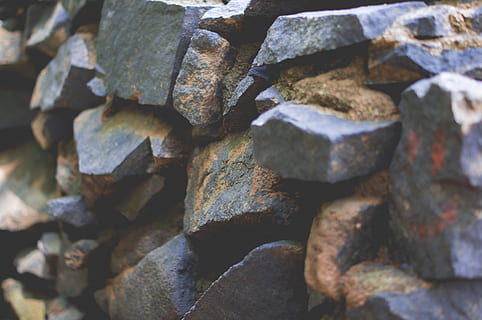 black riprap, full frame, stack, backgrounds, large group of objects, no people, abundance, close-up, textured, day, heap, pattern, outdoors, still life, rough, repetition, arrangement, solid, nature, wood - material, focus on foreground, 4K, CC0, public domain, royalty free