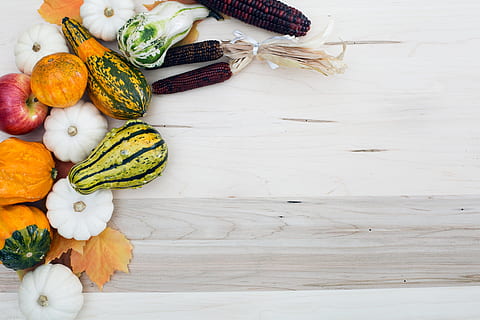 fall harvest spread photo, Flatlay, Fruit, Fall, Pumpkin, Seasons, Apple, Vegetables, Table, food and drink, food, healthy eating, vegetable, freshness, wellbeing, still life, no people, high angle view, indoors, choice, variation, wood - material, directly above, zucchini, root vegetable, carrot, leaves, vegetarian food, 4K, CC0, public domain, royalty free