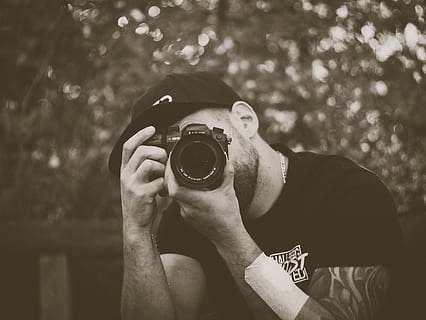 man holding camera, one person, real people, photography themes, holding, photographing, camera - photographic equipment, activity, focus on foreground, men, photographic equipment, technology, leisure activity, lifestyles, day, front view, digital camera, tree, casual clothing, portrait, photographer, outdoors, digital single-lens reflex camera, obscured face, slr camera, 4K, CC0, public domain, royalty free