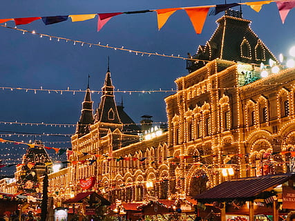 yellow lighted building, town, building, city, downtown, urban, architecture, metropolis, spire, tower, steeple, town square, plaza, worship, shrine, temple, pedestrian, office building, road, intersection, clock tower, building exterior, built structure, illuminated, decoration, sky, night, christmas, religion, place of worship, nature, christmas decoration, travel destinations, celebration, lighting equipment, belief, no people, outdoors, 4K, CC0, public domain, royalty free