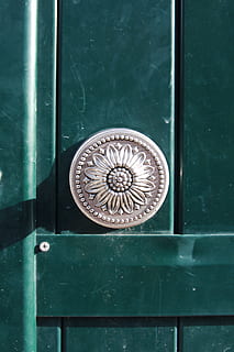 round gray frame, metal, door, entrance, close-up, protection, knob, doorknob, no people, safety, closed, security, day, wood - material, green color, full frame, lock, door knocker, pattern, old, design, ornate, silver colored, turquoise colored, 4K, CC0, public domain, royalty free
