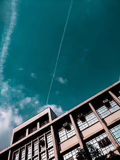 clear sky, building, housing, apartment building, town, high rise, city, urban, office building, scenery, outdoors, nature, landscape, convention center, architecture, downtown, built structure, building exterior, sky, cloud - sky, low angle view, no people, day, window, blue, water, vapor trail, transportation, tilt, residential district, turquoise colored, apartment, 4K, CC0, public domain, royalty free