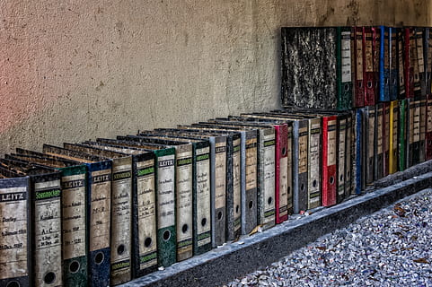 files, folder, index, file, regulation, stack, archive, forms, old, file away, office, transient, stapler, map, ring binders, documents, paperwork, invoices, in a row, large group of objects, architecture, no people, container, wall - building feature, arrangement, day, side by side, built structure, abundance, wood - material, building, outdoors, order, domestic room, wall, transportation, still life, concrete, 5K, CC0, public domain, royalty free