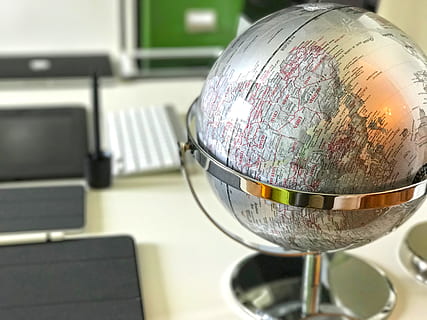 globe, desk, silver, indoors, globe - man made object, close-up, no people, focus on foreground, sphere, map, communication, still life, planet earth, table, day, text, world map, nature, education, architecture, science, silver colored, 4K, CC0, public domain, royalty free