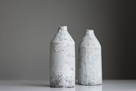 two, grey, bottles, surface, studio shot, indoors, copy space, bottle, no people, still life, container, single object, close-up, food and drink, white background, two objects, focus on foreground, table, white color, gray, cut out, four objects, water, purity, black background, 4K, CC0, public domain, royalty free