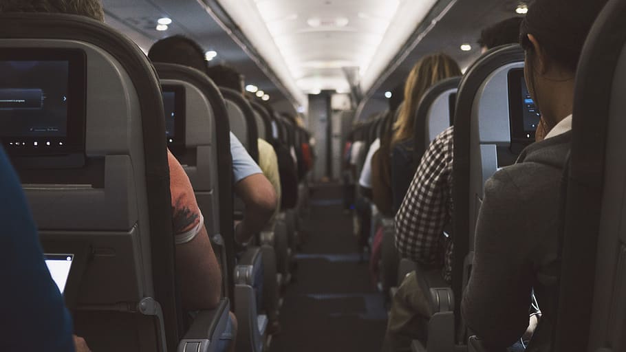 belize, Belize City, folla, aereo, mondo, viaggio, posti a sedere, interno del veicolo, modo di trasporto, sedile del veicolo, mezzi di trasporto, trasporto pubblico, posto a sedere, passeggeri, veicolo aereo, gruppo di persone, persone reali, di fila, uomini, retrovisore, seduta, persone, donne, adulto, corridoio, sedile dell'aereo, lusso, 4K
