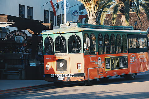 trolley, mode of transportation, architecture, transportation, building exterior, built structure, public transportation, city, street, land vehicle, rail transportation, cable car, day, track, railroad track, train, sunlight, train - vehicle, incidental people, nature, building, outdoors, 5K, CC0, public domain, royalty free