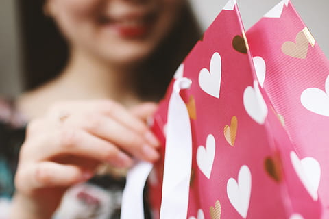 young, girl, unpacking, gift., valentine’s, day., one person, adult, indoors, women, holding, close-up, young adult, midsection, front view, selective focus, pink color, headshot, event, casual clothing, focus on foreground, brown hair, emotion, preparation, consumerism, 5K, CC0, public domain, royalty free