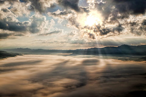 white, clouds, sun, piercing, light, mountains, nature, skyscape, sunlight, cloud - sky, sky, beauty in nature, scenics - nature, tranquility, tranquil scene, no people, cloudscape, environment, dramatic sky, idyllic, mountain, sunbeam, sunset, heaven, majestic, awe, outdoors, 4K, CC0, public domain, royalty free
