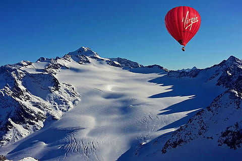 hot, air balloon, snow, nature, mountain, winter, cold temperature, scenics - nature, air vehicle, sky, balloon, mid-air, flying, beauty in nature, adventure, mountain range, blue, hot air balloon, clear sky, transportation, red, snowcapped mountain, no people, outdoors, mountain peak, 2K, CC0, public domain, royalty free