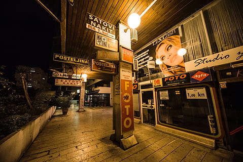 croatia, split, blade runner, soviet ghetto, street, illuminated, night, architecture, text, built structure, communication, lighting equipment, city, no people, building exterior, sign, western script, city life, outdoors, store, commercial sign, 5K, CC0, public domain, royalty free