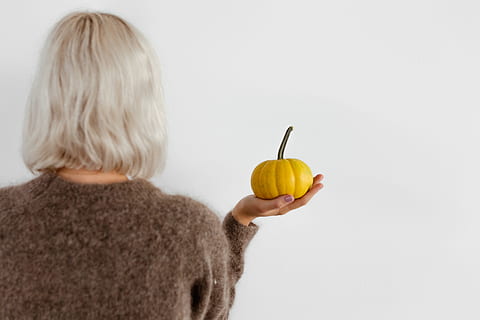 women, hands, sweater, holding, pumpkin, female, person, yellow, autumn, fall, orange, vegetable, halloween, food and drink, food, hair, blond hair, one person, healthy lifestyle, fruit, indoors, wellbeing, freshness, healthy eating, rear view, childhood, child, apple - fruit, hand, hairstyle, 5K