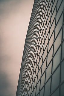 wormeye gray building, office building, building, banister, handrail, architecture, home decor, skyscraper, urban, wallpaper, windows, iphone wallpaper, android wallpaper, buiding, overcast, vanishing point, lockscreen, town, city, high rise, silhouette, building exterior, built structure, sky, office building exterior, modern, low angle view, office, tall - high, no people, sunset, nature, glass - material, pattern, day, outdoors, tower, 5K, CC0, public domain, royalty free