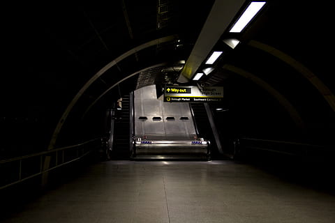 metro, train, station, underground, exite, way out, sign, yellow, stairs, escalator, quiet, lights, city, illuminated, architecture, indoors, lighting equipment, transportation, subway, no people, public transportation, tunnel, direction, the way forward, subway station, staircase, absence, empty, railing, light, arch, built structure, night, dark, ceiling, underground walkway, fluorescent light, underpass, 5K