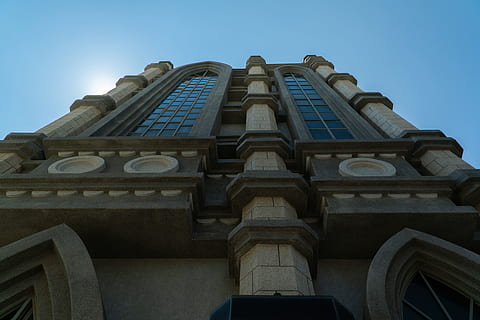 building, architecture, tower, clock tower, office building, taiwan, kaohsiung, structure, church, blue sky, bell tower, window, column, pillar, town, city, urban, metropolis, archaeology, emblem, built structure, low angle view, building exterior, sky, no people, clear sky, nature, day, travel destinations, history, the past, religion, outdoors, belief, place of worship, travel, blue, skyscraper, 4K, CC0, public domain, royalty free