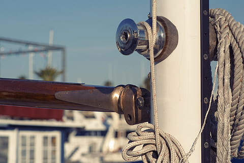 sailboat, pole, rope, focus on foreground, day, close-up, metal, architecture, built structure, building exterior, no people, outdoors, sunlight, nature, clear sky, sky, security, city, connection, building, strength, technology, 1080P, CC0, public domain, royalty free