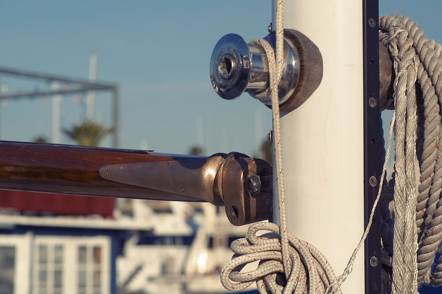 sailboat, pole, rope, focus on foreground, day, close-up, metal, architecture, built structure, building exterior, no people, outdoors, sunlight, nature, clear sky, sky, security, city, connection, building, strength, technology, 1080P
