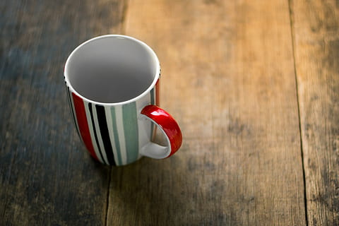 red, white, striped, ceramic, mug, brown, surface, cup, empty, food and drink, wood - material, drink, table, refreshment, coffee cup, coffee, coffee - drink, no people, close-up, indoors, high angle view, focus on foreground, hot drink, still life, freshness, copy space, wood grain, tea cup, non-alcoholic beverage, crockery, 5K, CC0, public domain, royalty free