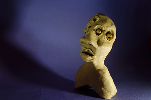 figure, plasticine, representation, sculpture, art and craft, indoors, no people, statue, human representation, studio shot, craft, creativity, colored background, single object, close-up, shadow, male likeness, table, the past, history, museum, copy space, 4K, CC0, public domain, royalty free