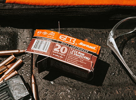 bullets, shooting, range, text, western script, transportation, mode of transportation, no people, day, communication, car, orange color, close-up, sign, land vehicle, high angle view, motor vehicle, outdoors, metal, safety, road, construction industry, 4K, CC0, public domain, royalty free