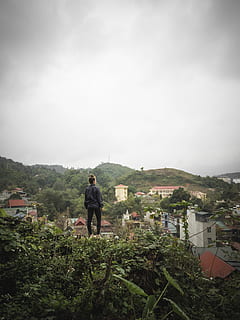 man, standing, tree, person, human, outdoors, scenery, nature, landscape, urban, building, countryside, slope, aerial view, roof, steeple, spire, architecture, tower, neighborhood, town, city, metropolis, building exterior, built structure, plant, day, sky, one person, men, environment, real people, cloud - sky, mountain, residential district, lifestyles, cityscape, looking at view, 5K, CC0, public domain, royalty free