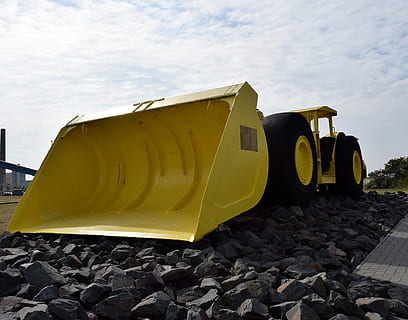 loader, hjul, maskine, arbejde, transportere, maskineri, sten-, konstruktion, gul, himmel, ingen mennesker, natur, sky - himmel, udendørs, dag, transportmidler, solid, klippe, vand, jord, transportform, rock-objekt, strand, nautiske fartøj, sten - objekt, dæk, tæt på, 1080P, CC0, offentligt domæne, royaltyfrie