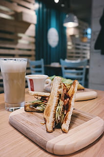 sliced sandwich, beer, blur, bread, brunch, caffeine, cappuccino, chairs, coffee, coffee shop, cup, delicious, drink, food, food counter, glass, health, hot, indoors, lunch, restaurant, sandwich, still life, tapas, toast, traditional, wood, wooden, food and drink, freshness, table, ready-to-eat, refreshment, drinking glass, household equipment, wood - material, serving size, focus on foreground, no people, close-up, business, snack, 5K, CC0, public domain, royalty free
