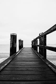 gray wooden deck, water, waterfront, dock, port, pier, bridge, building, boardwalk, wood, staircase, black and white, black, cold, minimalistic, minimal, contrast, sea, wallpaper, monochrome, blackwhite, the way forward, direction, sky, wood - material, built structure, diminishing perspective, architecture, connection, no people, nature, railing, tranquility, clear sky, day, tranquil scene, bridge - man made structure, outdoors, horizon over water, long, wood paneling, 5K, CC0, public domain, royalty free