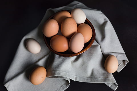 free range eggs, egg, eggs, range, fresh, ingredient, ingredients, food, food and drink, healthy eating, brown, wellbeing, freshness, indoors, studio shot, fragility, raw food, black background, no people, animal egg, vulnerability, high angle view, medium group of objects, group of objects, directly above, egg carton, 5K