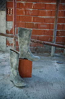 construction, boots, work, object, brick, workspace, business, brick wall, wall, no people, architecture, wall - building feature, built structure, day, wood - material, outdoors, close-up, focus on foreground, building exterior, metal, nature, heat - temperature, hand tool, old, seat, 5K, CC0, public domain, royalty free