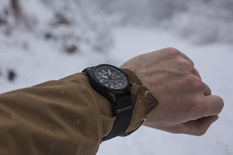 person, brown, long-sleeved, top, wearing, chronograph, watch, blur, blurred background, close -up, cold, daylight, fashion, foggy, frost, frosty, frozen, hand, ice, icee, icy, landscape, man, outdoors, scenic, season, snow, snowfall, snowy, weather, winter, wrist watch, one person, wristwatch, time, adult, human hand, human body part, nature, focus on foreground, looking, day, close-up, men, portrait, headshot, watching, checking the time, 5K, CC0, public domain, royalty free