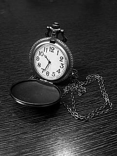 clock, time, watch, timepiece, locket, analog, pocket watch, still life, indoors, table, instrument of time, high angle view, number, no people, metal, close-up, antique, personal accessory, accuracy, wood - material, chain, single object, minute hand, clock face, steel, silver colored, 4K, CC0, public domain, royalty free