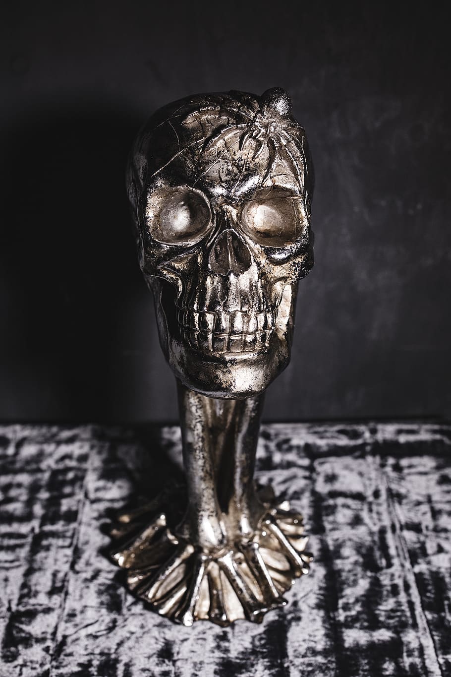 halloween skulls decorations, decor, decorations, autumn, fall, skull, halloween, spooky, scary, skulls, close-up, no people, metal, art and craft, indoors, representation, wood - material, focus on foreground, human representation, creativity, craft, sculpture, table, still life, single object, antique, human skeleton, male likeness, studio shot, selective focus, black background, 4K