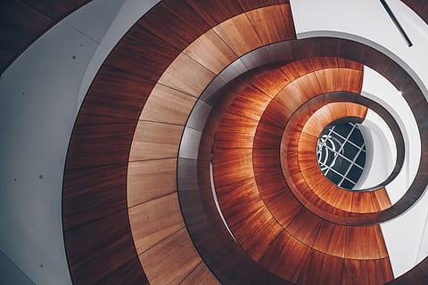 spiral architecture, architecture, spiral, staircase, spiral staircase, steps and staircases, railing, built structure, indoors, no people, shape, pattern, wood - material, geometric shape, circle, design, day, modern, high angle view, directly above, curve, directly below, 4K, CC0, public domain, royalty free