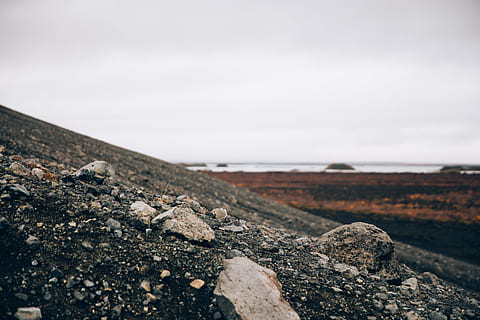 crumbling, volcanic, hillside, day, Cloud, Cloudy, Desert, Eruption, Formation, Hill, Land, Landscape, Mountain, Rock, Sand, Sky, altitude, ash, desolate, dry, haze, lava, mountains, natural, nature, regions, stone, summer, summit, volcano, solid, rock - object, no people, cloud - sky, tranquility, scenics - nature, sea, outdoors, focus on foreground, beauty in nature, tranquil scene, environment, textured, beach, rough, 2K, CC0, public domain, royalty free