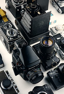 sort sort kameraer, analog, åbning, assorteret, kameraer, klassisk, kollektion, apparat, elektronik, udstyr, fokus, instrument, linse, moderne, optisk, optik, fotografering, retro, lukker, lyd, teknologi, bred vifte, video, videooptagelse, søgeren, årgang, zoom, kamera - fotografisk udstyr, fotografering temaer, indendørs, stilleben, fotografisk udstyr, høj vinkel visning, ingen mennesker, stor gruppe af objekter, tæt på, retro stylet, kunstkultur og underholdning, filmindustrien, objektiv - optisk instrument, digitalt kamera, kamera, sort farve, 5K, CC0, offentligt domæne, royaltyfrie