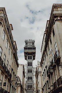 view, historic, elevator, lisbon, portugal, lift, santa justa lift, building exterior, architecture, built structure, cloud - sky, city, building, low angle view, sky, day, residential district, window, no people, nature, outdoors, travel destinations, history, the past, balcony, travel, tourism, apartment, 5K, CC0, public domain, royalty free