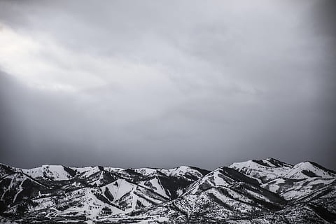 mountain, pine, tree, snow, winter, weather, clouds, black and white, sky, cold, landscape, cloud - sky, cold temperature, environment, scenics - nature, no people, nature, beauty in nature, non-urban scene, day, tranquility, snowcapped mountain, tranquil scene, mountain range, extreme terrain, outdoors, mountain peak, 8K, CC0, public domain, royalty free