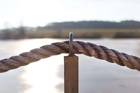 rope, rust, knot, lock, railing, steel, whistle, chain, architecture, building, tower, bungee, flagstone, wire, slate, handle, money, hook, limestone, grille, focus on foreground, day, wood - material, close-up, no people, outdoors, metal, sky, connection, strength, rusty, nature, old, water, pole, built structure, fence, boundary, wooden post, 5K, CC0, public domain, royalty free