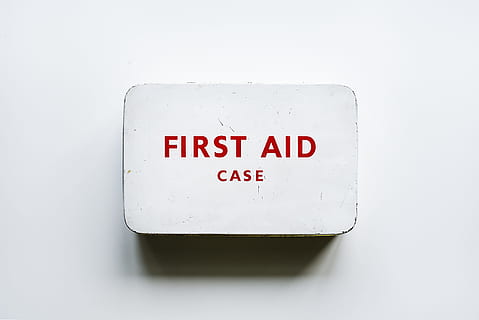 first, aid case, wall, box, care, case, cure, emergency, equipment, first aid, first aid kit, kit, medical, text, western script, white background, studio shot, communication, indoors, no people, single object, sign, close-up, warning sign, capital letter, white color, label, cut out, fun, cold temperature, red, closed, simplicity, clean, 4K, CC0, public domain, royalty free