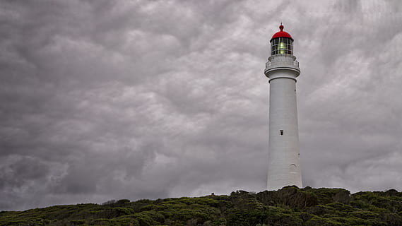 lighthouse, building, architecture, tower, beacon, split point lighthouse, australia, victoria, clouds, airey's inlet, coast, housing, cottage, house, flying, animal, bird, church, indoors, fireplace, cloud - sky, sky, building exterior, guidance, storm, nature, built structure, travel destinations, no people, environment, day, beauty in nature, dramatic sky, low angle view, travel, outdoors, ominous, 5K, CC0, public domain, royalty free