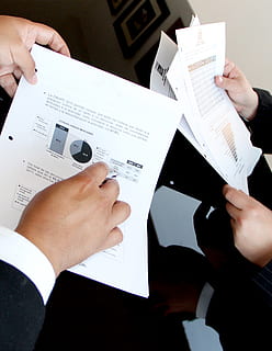 person, holding, document papers, charts, corporate, data, document, graphs, marketing, paperwork, teamwork, work, hand, human hand, real people, people, adult, human body part, men, indoors, paper, women, pen, communication, business, table, high angle view, body part, finger, 1080P, CC0, public domain, royalty free