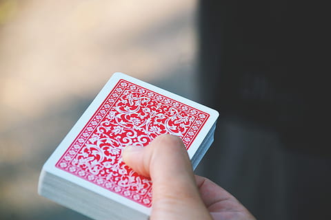 magic trick, various, magic, human hand, hand, holding, human body part, communication, close-up, red, one person, single object, technology, cards, indoors, arts culture and entertainment, leisure games, wireless technology, selective focus, letter, container, anticipation, finger, 2K, CC0, public domain, royalty free