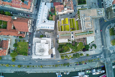 aerial, city view, crossroads, roads, houses, buildings, city, architecture, building exterior, built structure, high angle view, building, no people, day, land vehicle, street, mode of transportation, transportation, cityscape, residential district, aerial view, modern, road, outdoors, motor vehicle, 4K, CC0, public domain, royalty free