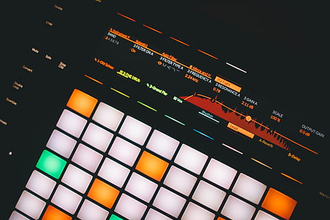 turned-on touchpad, button, control, drum machine, electronic, production, light, neon, equalizer, audio, music, technology, tech, text, calendar, building, housing, electronics, console, high rise, city, multi colored, no people, indoors, illuminated, arts culture and entertainment, backgrounds, close-up, full frame, night, pattern, industry, equipment, low angle view, electronics industry, dark, modern, yellow, lighting equipment, black background, 5K, CC0, public domain, royalty free