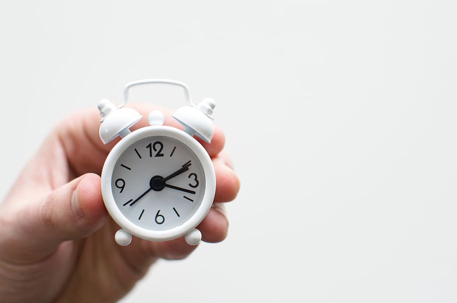 tiny, alarm, clock, time, hand, alarm clock, human hand, clock face, copy space, human body part, white background, studio shot, number, indoors, minute hand, single object, holding, close-up, deadline, cut out, morning, second hand, finger, checking the time, countdown, 5K