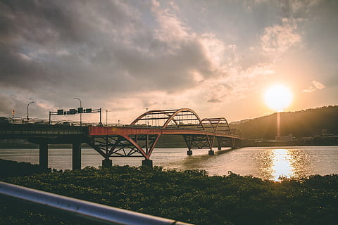 landscape photo, bridge, body, water, clouds, dusk, landscape, mountain, nature, outdoors, reflection, river, sky, sun, sunbeam, sunrays, sunset, trees, public domain images, built structure, architecture, cloud - sky, bridge - man made structure, connection, plant, sunlight, building exterior, tree, beauty in nature, transportation, no people, lens flare, 5K, CC0, public domain, royalty free