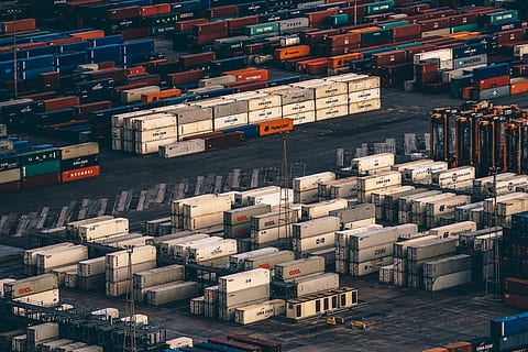 container, van, export, travel, cargo, wharf, cargo container, freight transportation, transportation, architecture, shipping, business, large group of objects, building, commercial dock, industry, stack, no people, pier, high angle view, mode of transportation, domestic room, box, abundance, day, outdoors, station, 5K