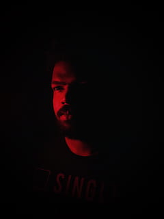 portrait, red, lowlight, devil, one-man, moody, indoors, dark, wallpaper, one person, black background, studio shot, communication, headshot, evil, sign, human body part, men, front view, warning sign, text, looking at camera, aggression, ominous, 4K, CC0, public domain, royalty free